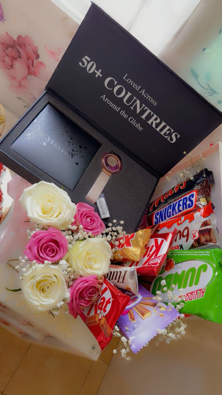 Luxury gift box with roses, chocolates, and watch from Zara Cakes & Bakes Riyadh