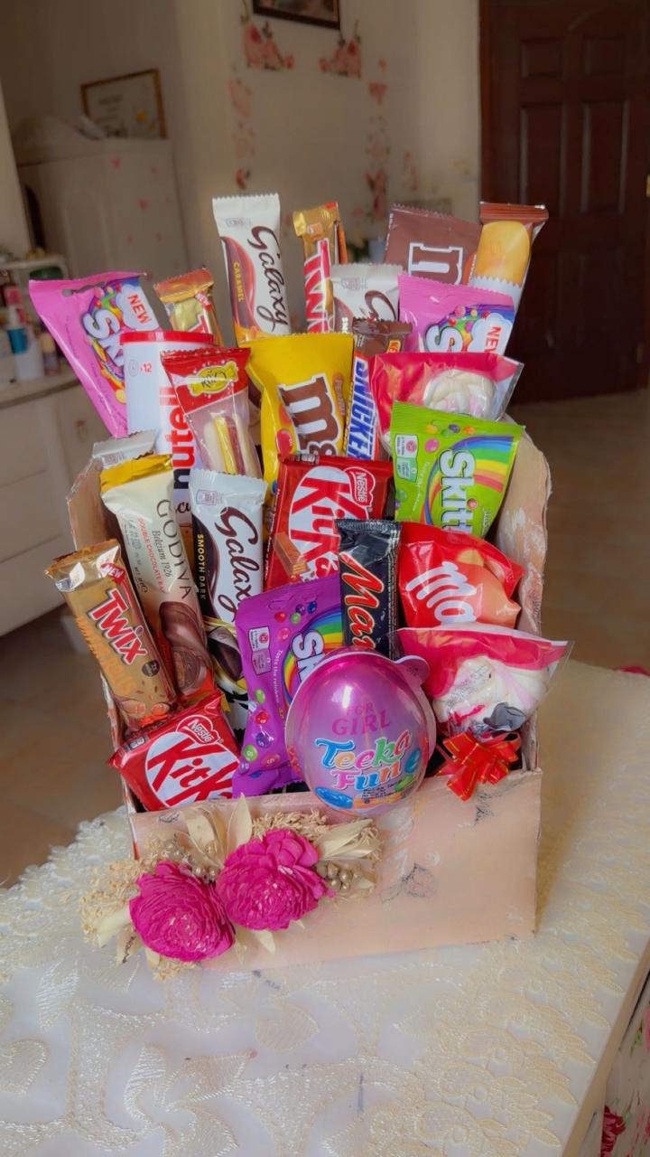 Luxury chocolate candy bouquet gift box with KitKat, Galaxy, and Skittles from Zara Cakes Riyadh